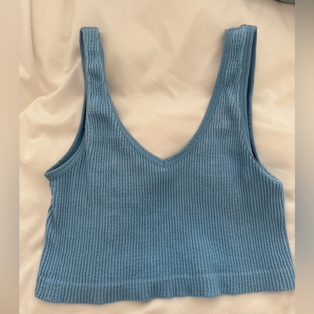 Light Blue ribbed tank top V neck or Scoop neck no tags fits like a small